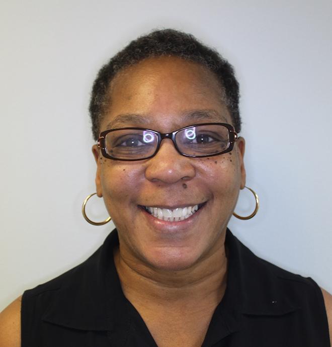 Portrait of happy, smiling woman after treatment at Carolina Complete Dental