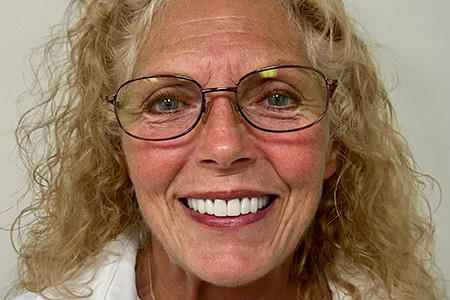 Woman with repaired, flawless teeth