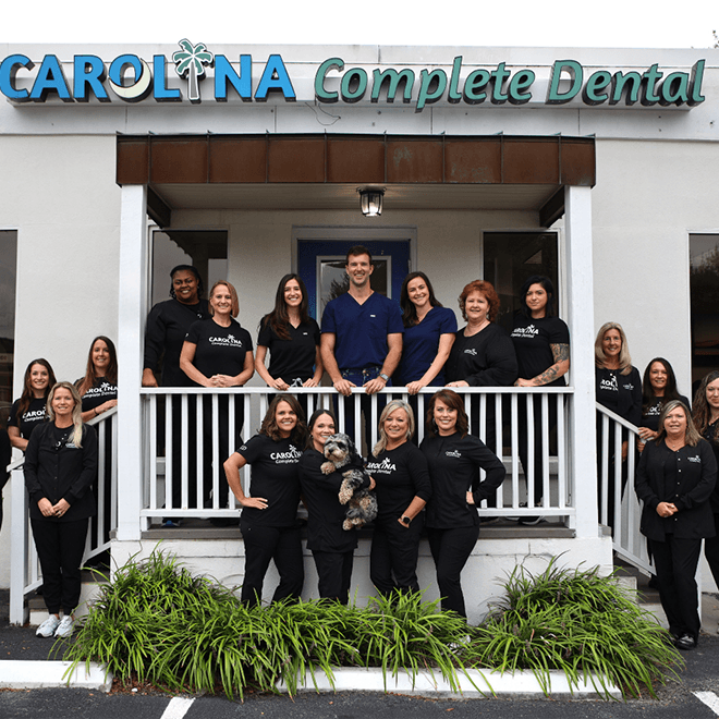 Carolina Complete Dental team standing outside the office
